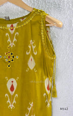 Mustard cotton top and bottom coord set with cream and rust motifs, tassel detailing and front mirror work.