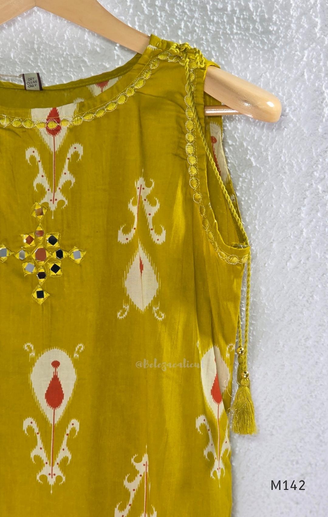 Mustard cotton top and bottom coord set with cream and rust motifs, tassel detailing and front mirror work.