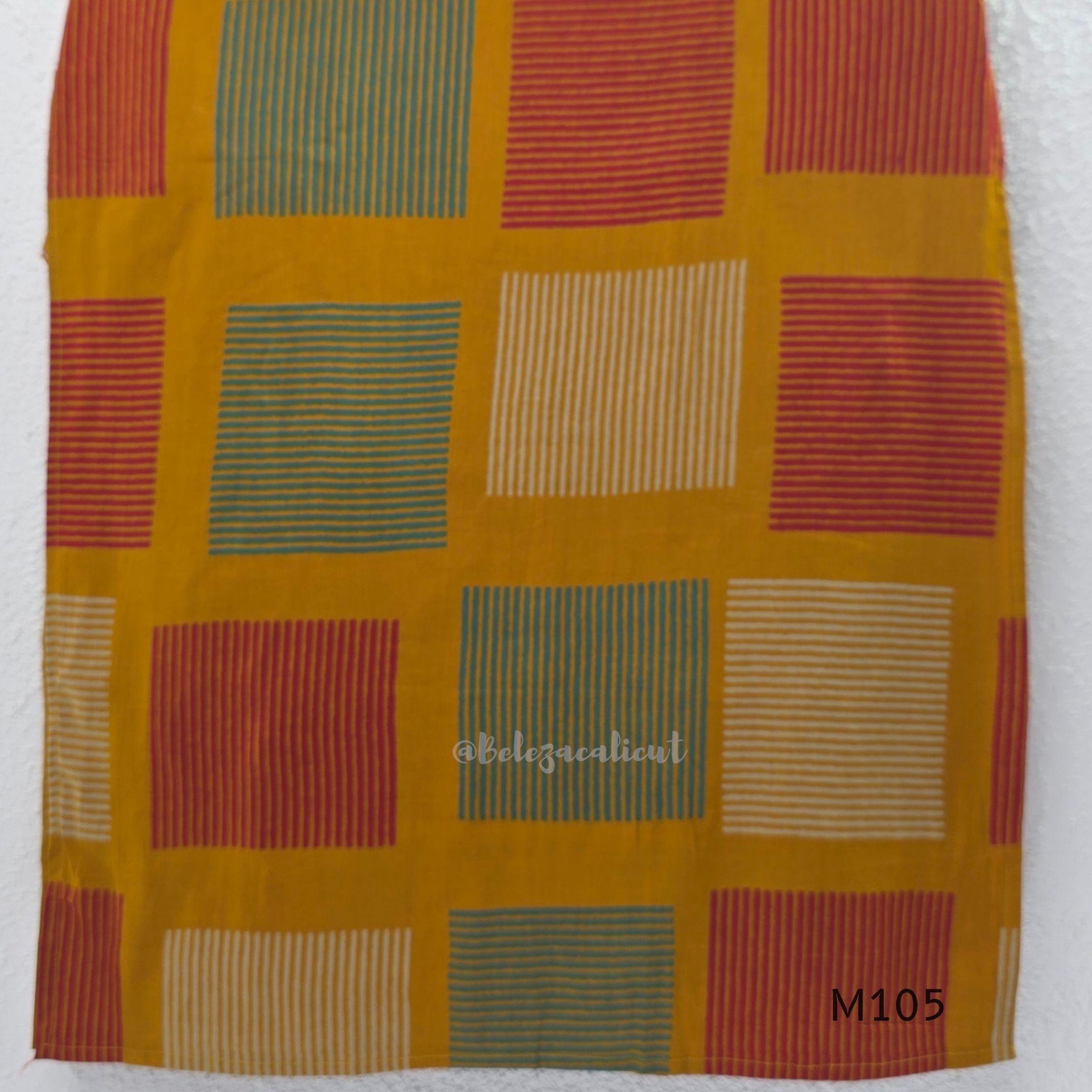 Warm mustard cotton long kurta with teal, deep pink and off-white striped rectangular motifs, V-neck and three-quarter sleeves.