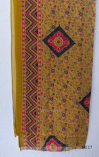 Mustard Jaipur cotton three-piece churidar set with mirror-detail yoke, printed borders and coordinated printed dupatta.