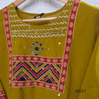 Mustard Jaipur cotton three-piece churidar set with mirror-detail yoke, printed borders and coordinated printed dupatta.