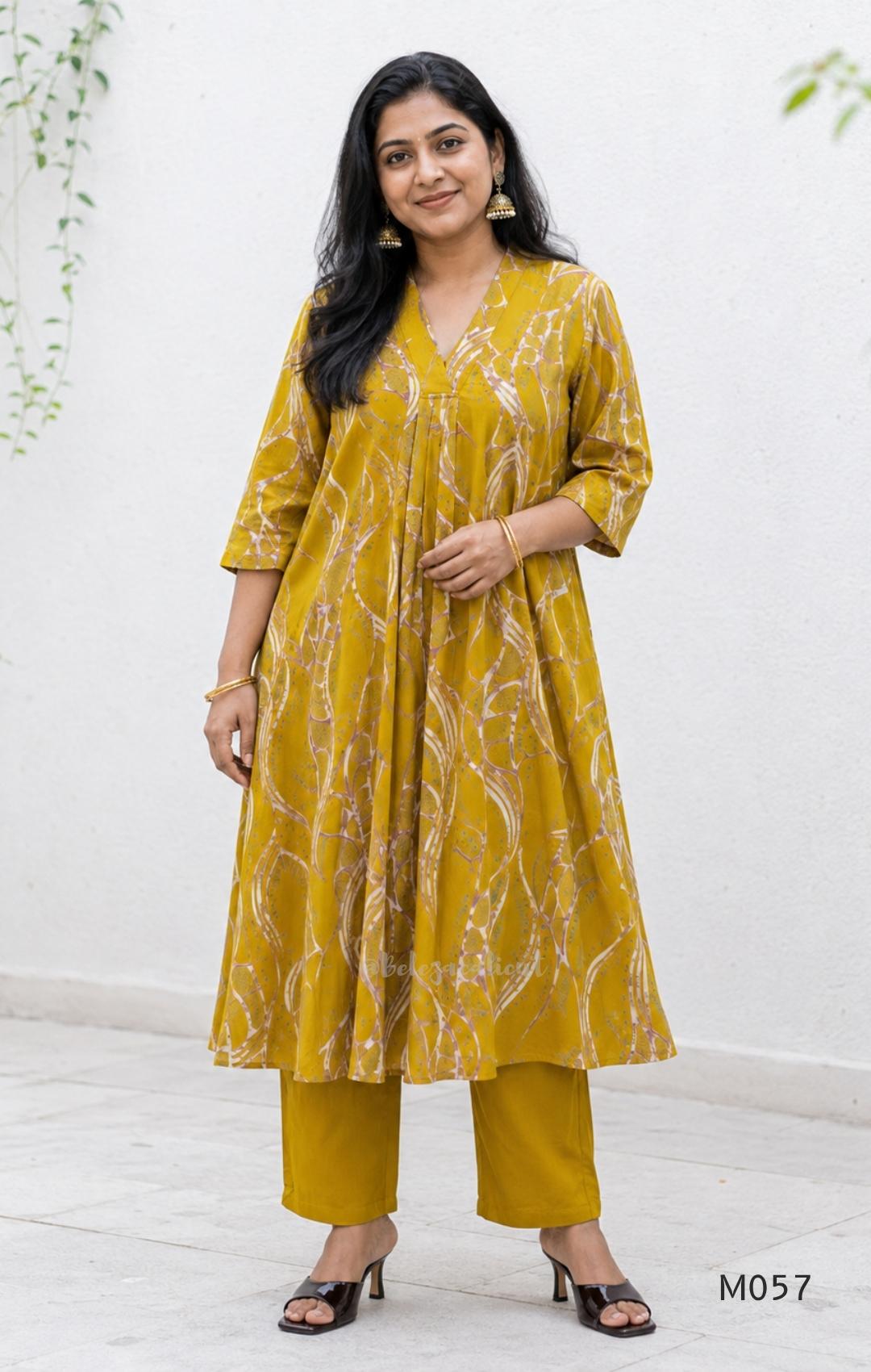 Warm mustard silk blend 2-piece set with abstract cream and taupe print, A-line mid-calf top and matching plain mustard pant.