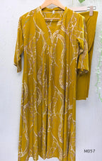 Warm mustard silk blend 2-piece set with abstract cream and taupe print, A-line mid-calf top and matching plain mustard pant.