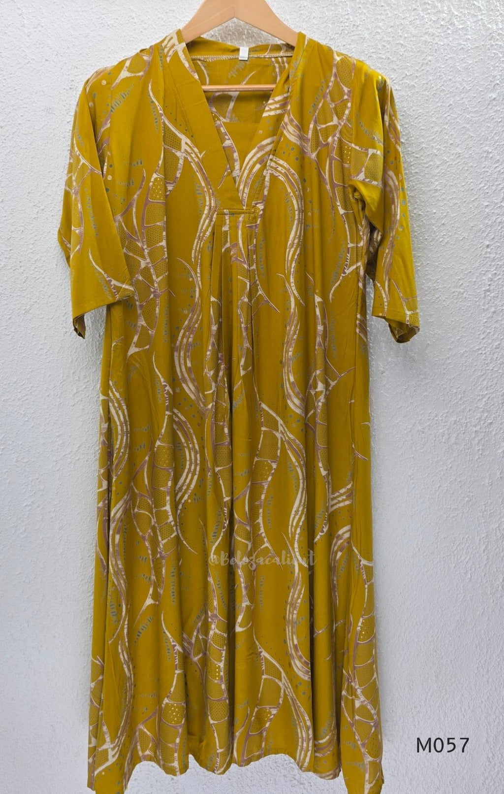 Warm mustard silk blend 2-piece set with abstract cream and taupe print, A-line mid-calf top and matching plain mustard pant.