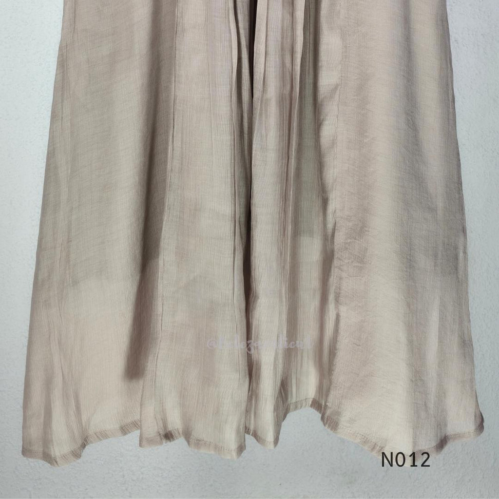 Muted ash-taupe Mul Chanderi churidar set with black leaf-pattern yoke, straight pants and matching bordered dupatta.