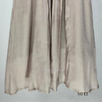 Muted ash-taupe Mul Chanderi churidar set with black leaf-pattern yoke, straight pants and matching bordered dupatta.
