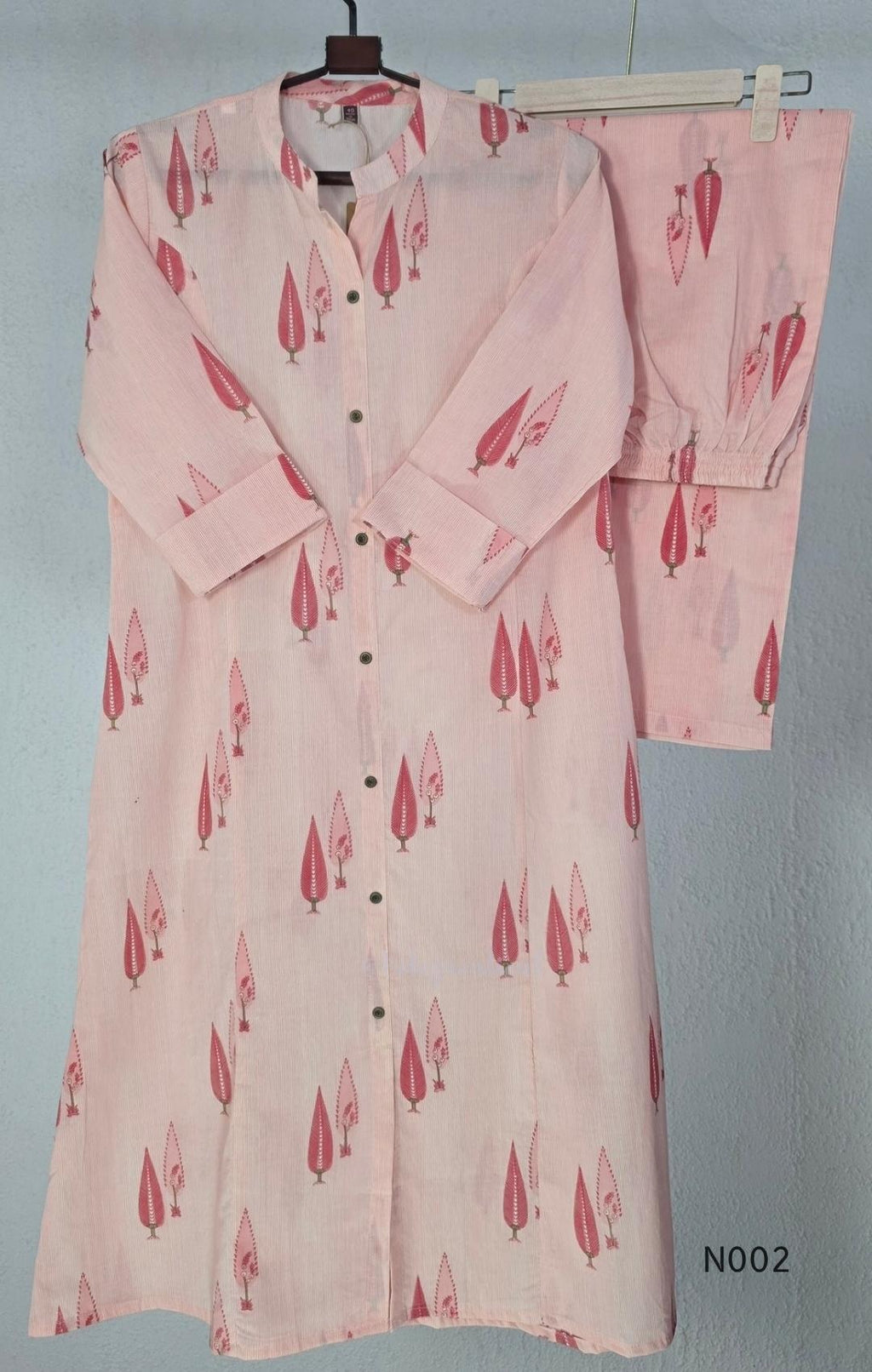 Soft peach cotton printed A-line button-front kurta with pink botanical motifs and matching wide-leg palazzo trousers. - view 2