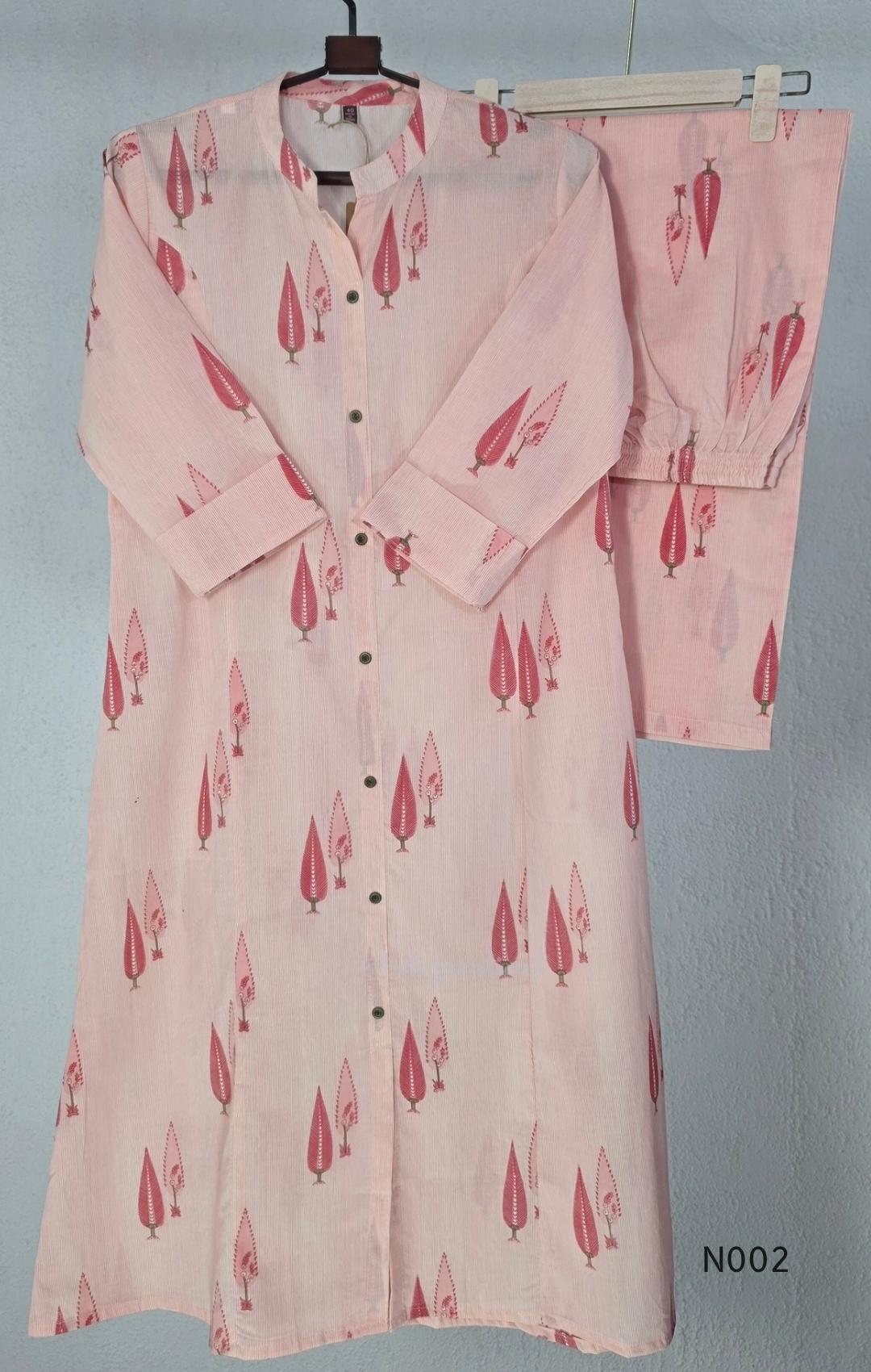 Soft peach cotton printed A-line button-front kurta with pink botanical motifs and matching wide-leg palazzo trousers. - view 2