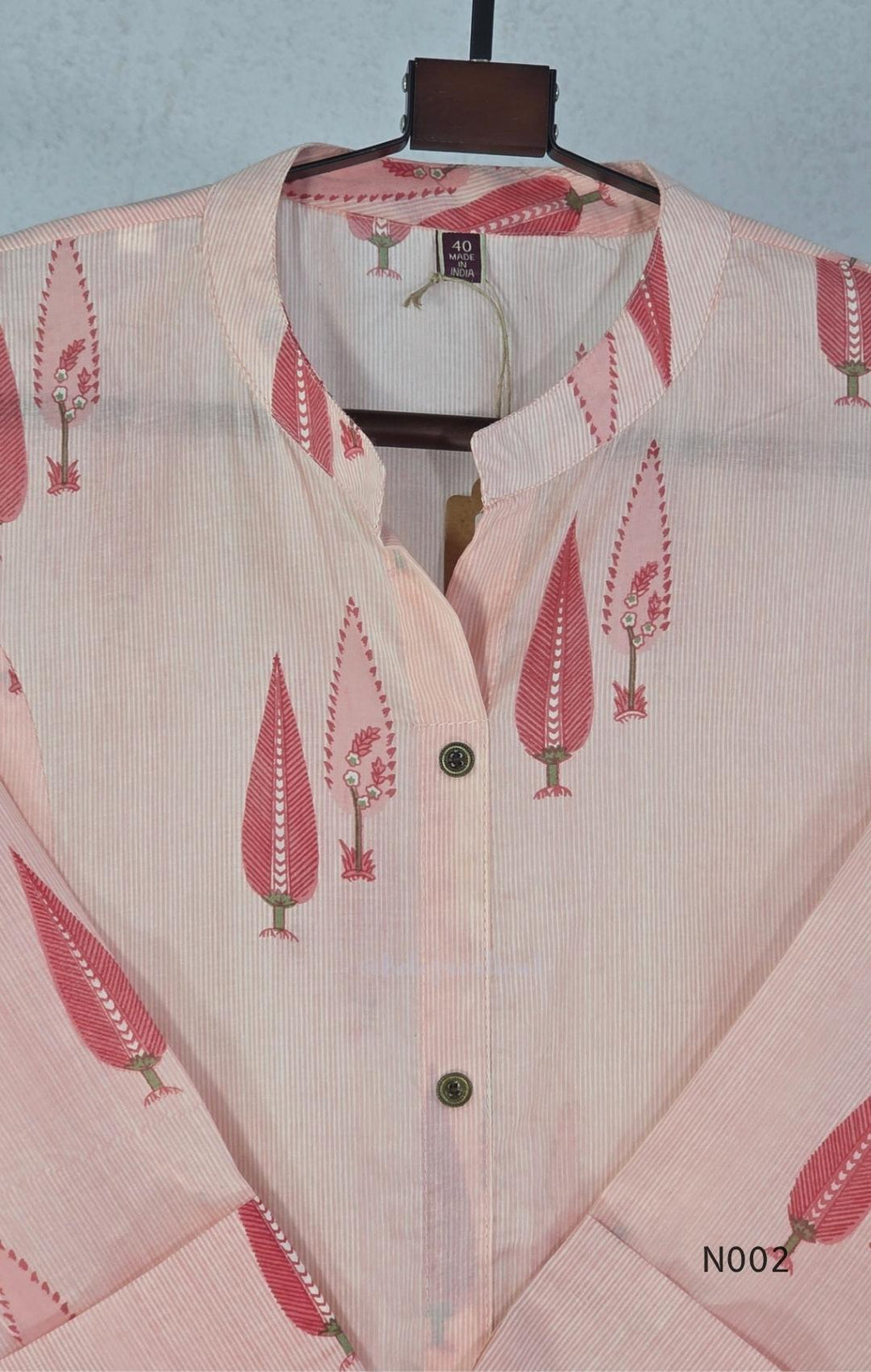Soft peach cotton printed A-line button-front kurta with pink botanical motifs and matching wide-leg palazzo trousers. - view 3