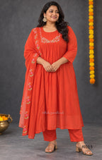 Vermilion-orange Mul Chanderi floral churidar set with a matching dupatta and straight-leg bottom.