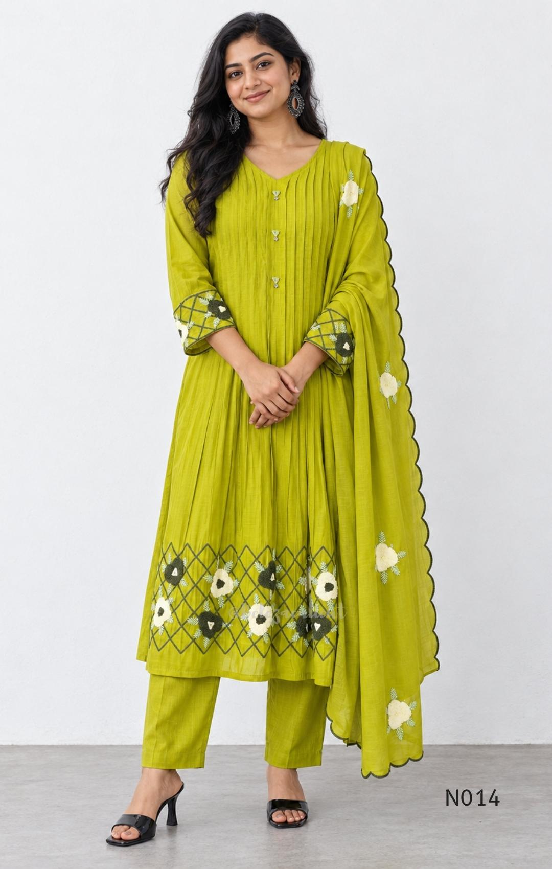 Yellow-toned lime green Mul Chanderi three-piece churidar set with a pleated V-neck kurta, floral and lattice embroidery, straight pants and a floral dupatta.
