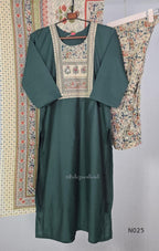 Bottle green Chanderi-blend churidar set with a printed yoke, patterned cotton straight pants and a printed cotton dupatta. - view 2