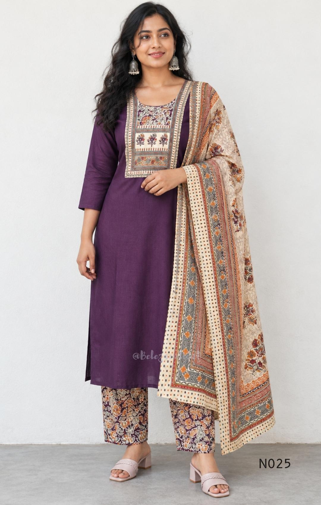 Grape-purple Chanderi silk-blend churidar set with a cream printed yoke, patterned cotton straight pants and a floral cotton dupatta.