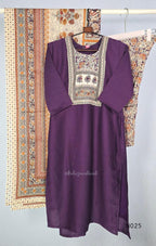 Grape-purple Chanderi silk-blend churidar set with a cream printed yoke, patterned cotton straight pants and a floral cotton dupatta.