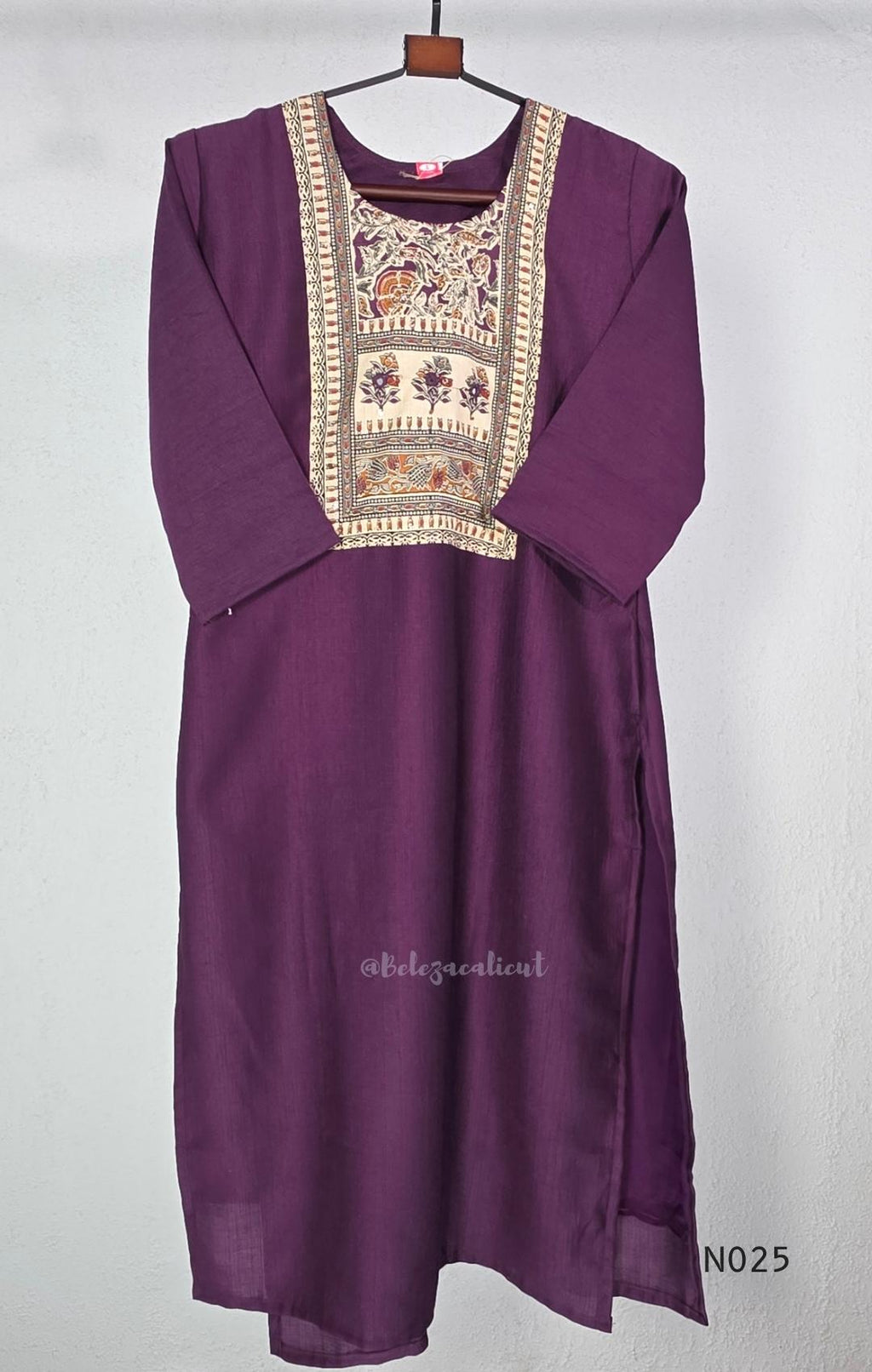 Grape-purple Chanderi silk-blend churidar set with a cream printed yoke, patterned cotton straight pants and a floral cotton dupatta.