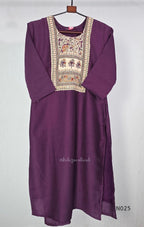 Grape-purple Chanderi silk-blend churidar set with a cream printed yoke, patterned cotton straight pants and a floral cotton dupatta.