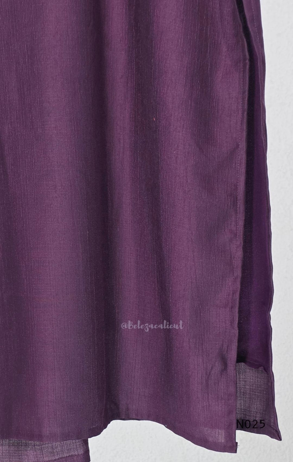 Grape-purple Chanderi silk-blend churidar set with a cream printed yoke, patterned cotton straight pants and a floral cotton dupatta.