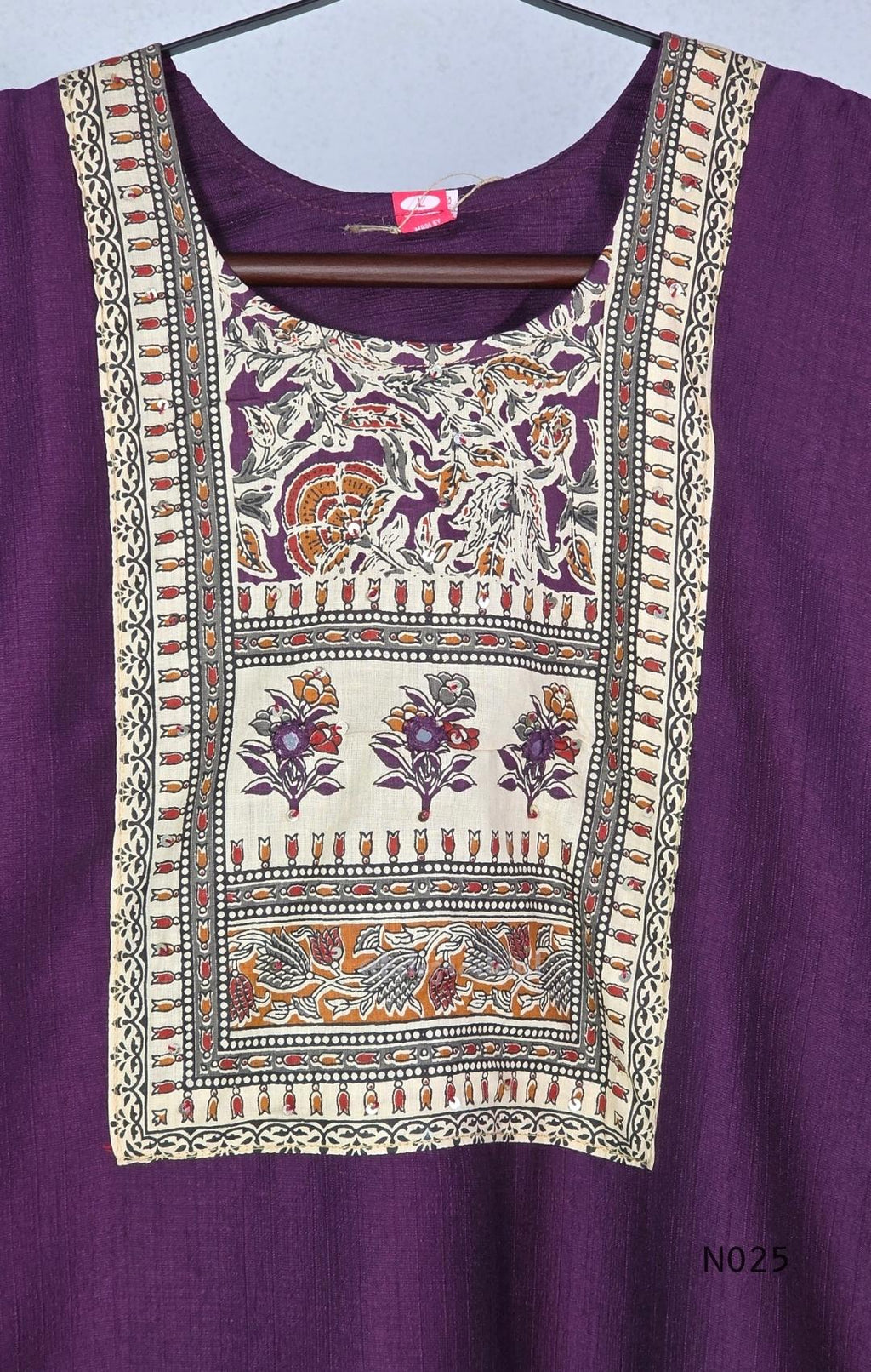Grape-purple Chanderi silk-blend churidar set with a cream printed yoke, patterned cotton straight pants and a floral cotton dupatta.