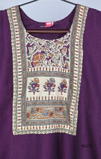 Grape-purple Chanderi silk-blend churidar set with a cream printed yoke, patterned cotton straight pants and a floral cotton dupatta.