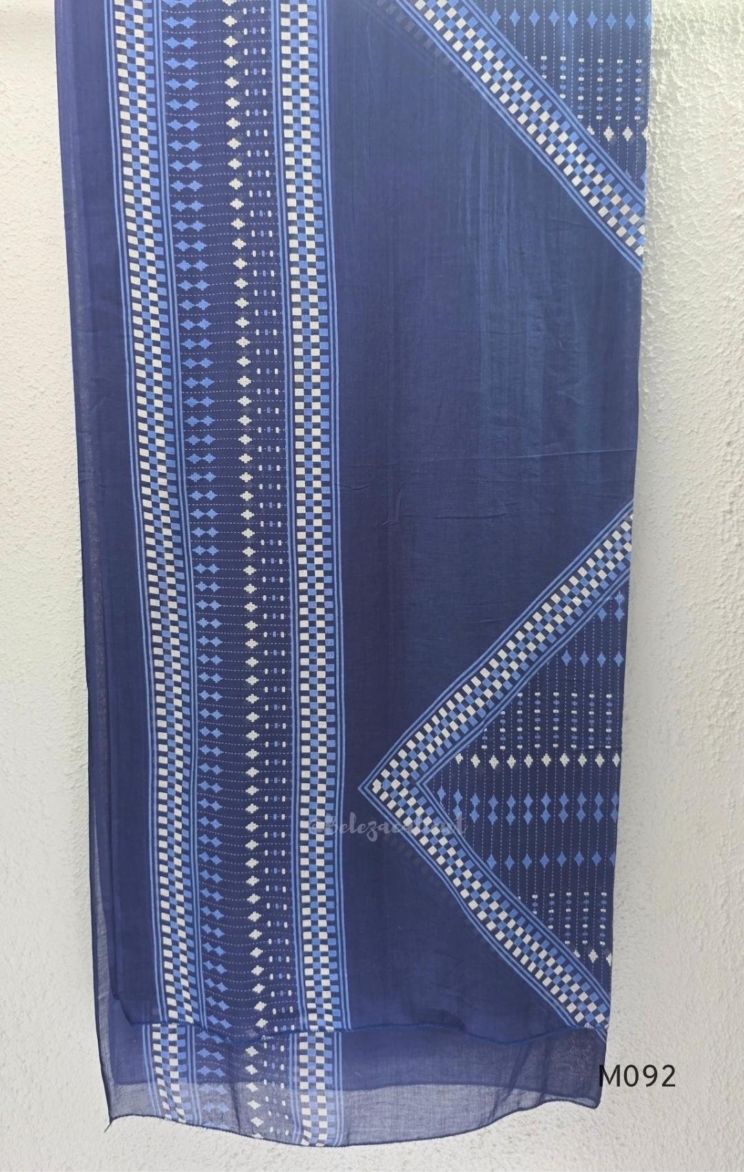 Deep navy blue cotton-blend churidar set with geometric print, embroidered V-neckline, plain wide straight bottom and printed dupatta.