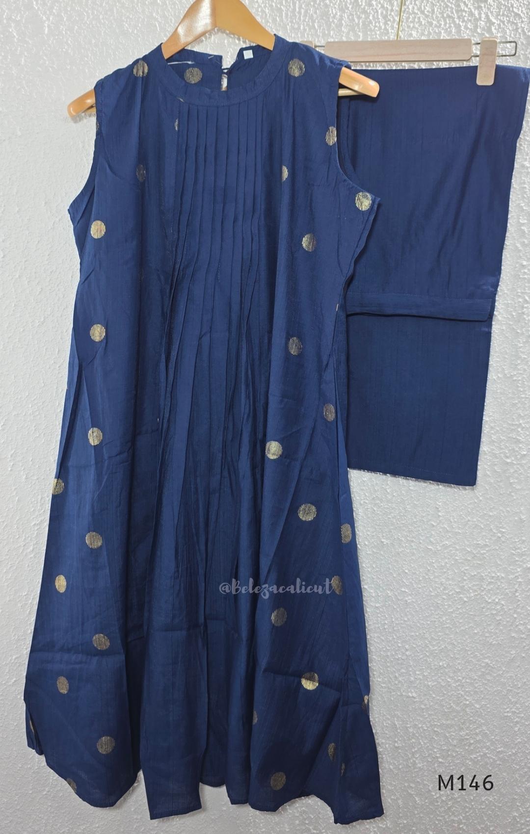 Navy blue Vertigan silk top and pant co-ord set with centre pleats and metallic gold circular side motifs.