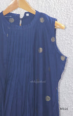 Navy blue Vertigan silk top and pant co-ord set with centre pleats and metallic gold circular side motifs.