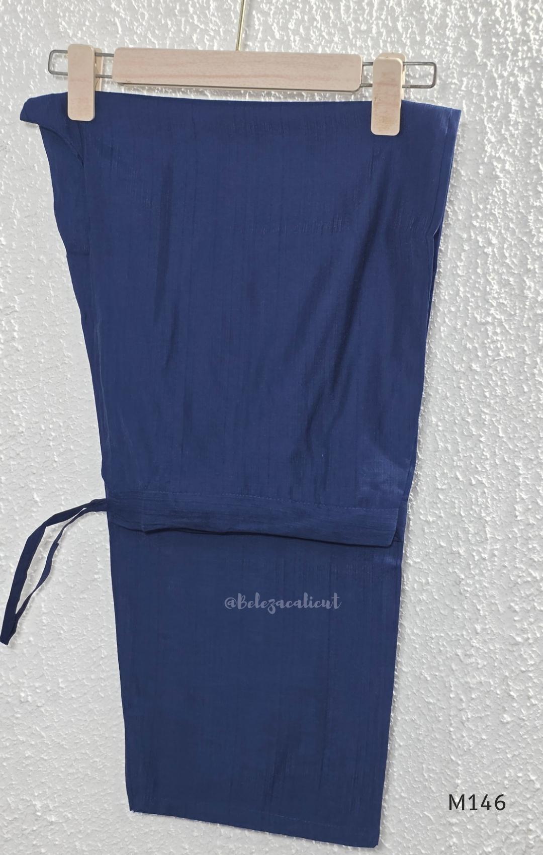 Navy blue Vertigan silk top and pant co-ord set with centre pleats and metallic gold circular side motifs.