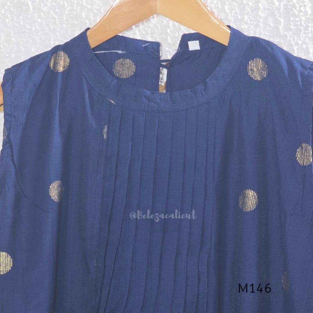 Navy blue Vertigan silk top and pant co-ord set with centre pleats and metallic gold circular side motifs.
