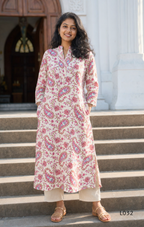 Off-white pure cotton kurti set with pink paisley floral print and matching cotton bottom, available at Beleza Calicut Kerala.