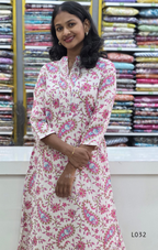 Off-white pure cotton kurti set with pink paisley floral print and matching cotton bottom, available at Beleza Calicut Kerala.