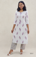 Off white cotton 2-piece kurti set with lavender leaf print, striped bottom, 3/4 sleeves, and tassel neckline worn by model.