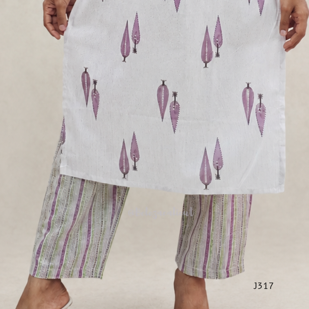 Off white cotton 2-piece kurti set with lavender leaf print, striped bottom, 3/4 sleeves, and tassel neckline worn by model.