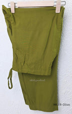 Olive green Cotton Silk churidar set with printed motifs, embroidered floral hem and cream-and-olive printed dupatta.