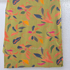 Olive green Jaipur cotton 3-piece churidar set with multicolour floral print, contrast dupatta, and printed straight bottom.