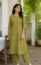Olive green silk blend 2-piece kurti set with pink and beige leaf print, short sleeve A-line kurti and matching straight pant.