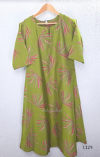 Olive green silk blend 2-piece kurti set with pink and beige leaf print, short sleeve A-line kurti and matching straight pant.