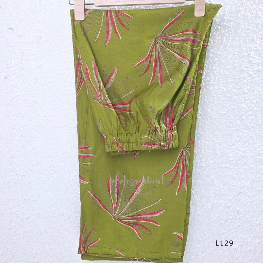 Olive green silk blend 2-piece kurti set with pink and beige leaf print, short sleeve A-line kurti and matching straight pant.