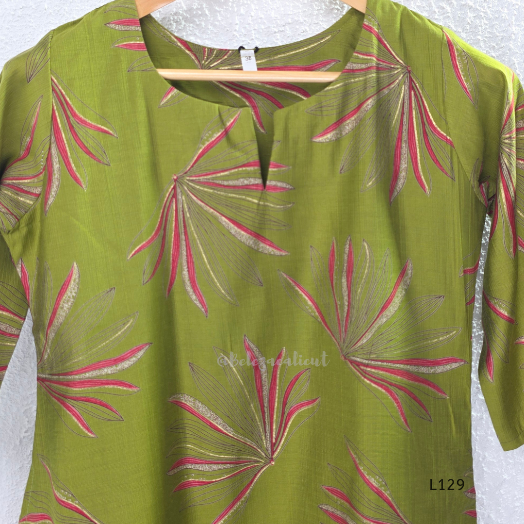 Olive green silk blend 2-piece kurti set with pink and beige leaf print, short sleeve A-line kurti and matching straight pant.