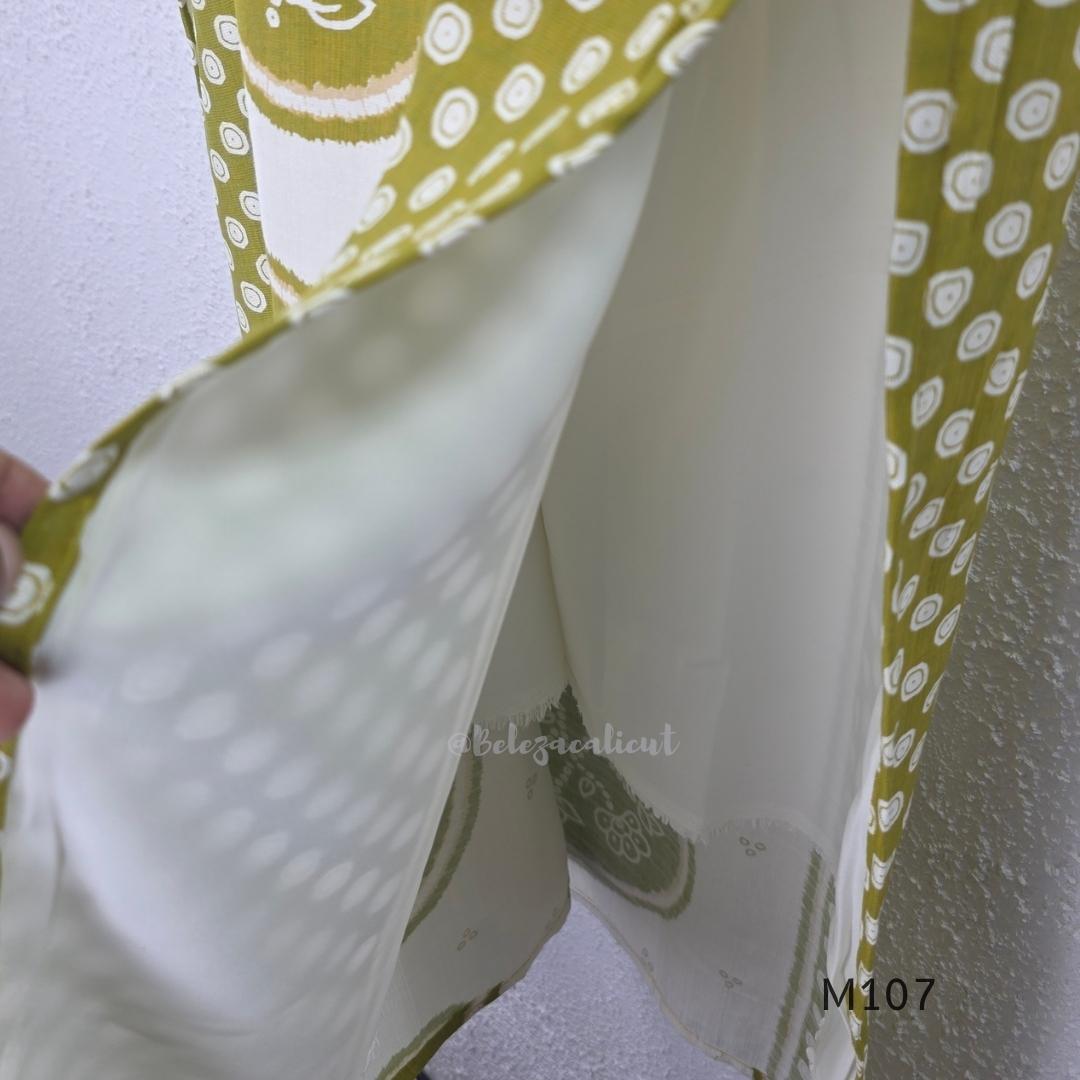 Olive green and ivory silk blend long kurta with botanical medallion centre print, small ring-pattern side panels and shirt collar.