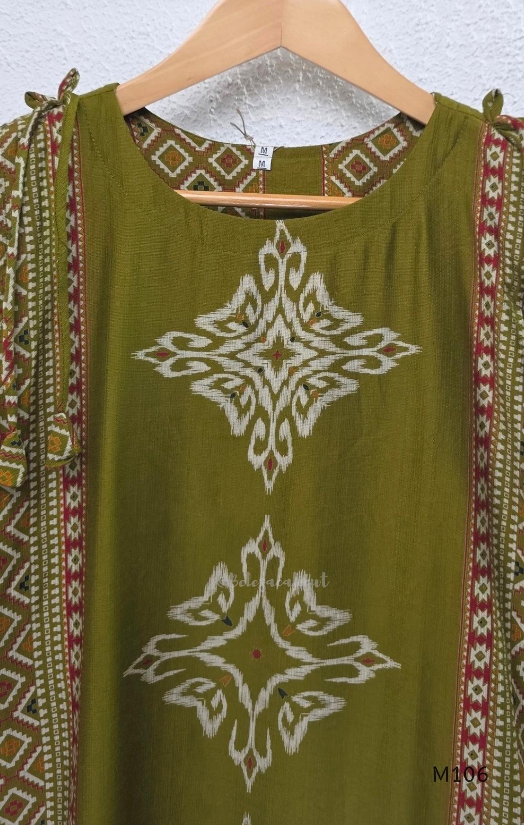 Olive green vertigan silk 2-piece set with straight kurta, white motif work, printed border panels and matching bottom.