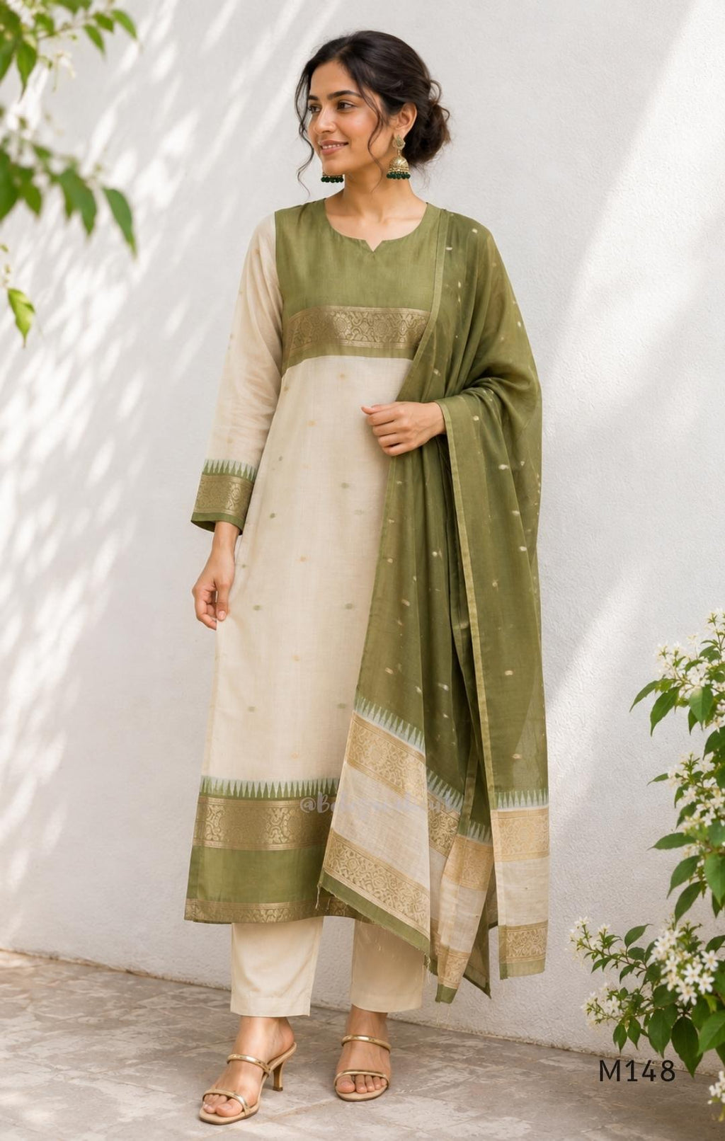Olive green and ivory tissue blend churidar set with gold woven borders, scattered motifs, straight bottom and matching dupatta.