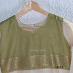 Olive green and ivory tissue blend churidar set with gold woven borders, scattered motifs, straight bottom and matching dupatta.