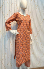 orange patterned dress 