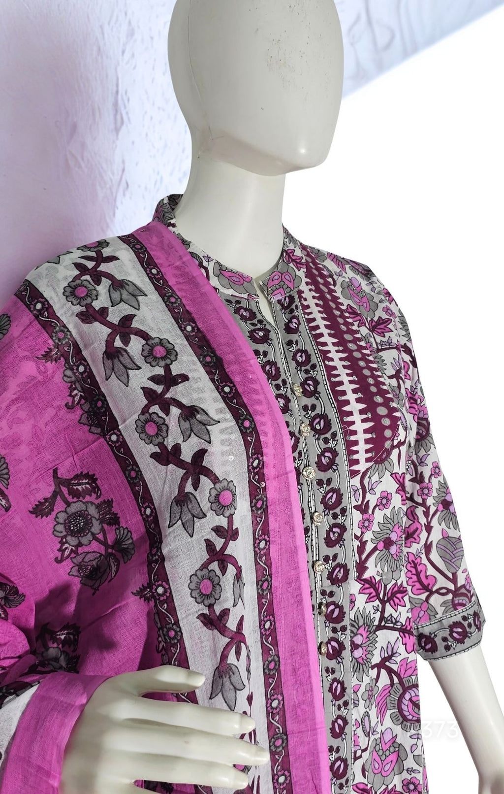 A 3-piece cotton kurta set in soft lilac and white, adorned with intricate floral block prints