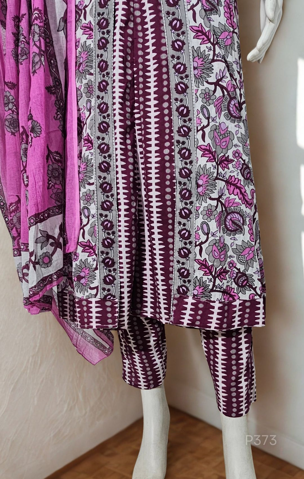 A 3-piece cotton kurta set in soft lilac and white, adorned with intricate floral block prints