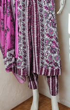 A 3-piece cotton kurta set in soft lilac and white, adorned with intricate floral block prints
