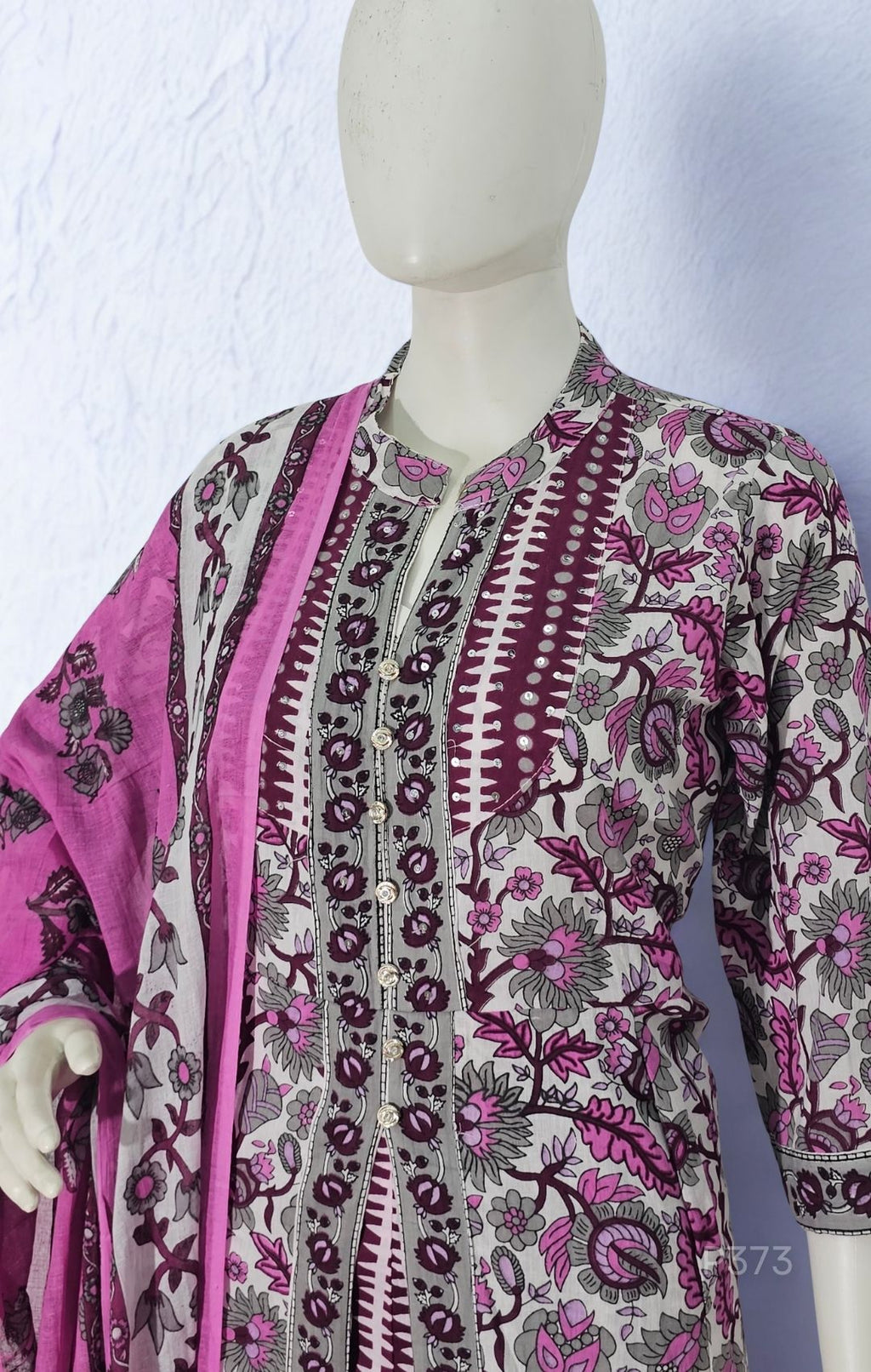 A 3-piece cotton kurta set in soft lilac and white, adorned with intricate floral block prints