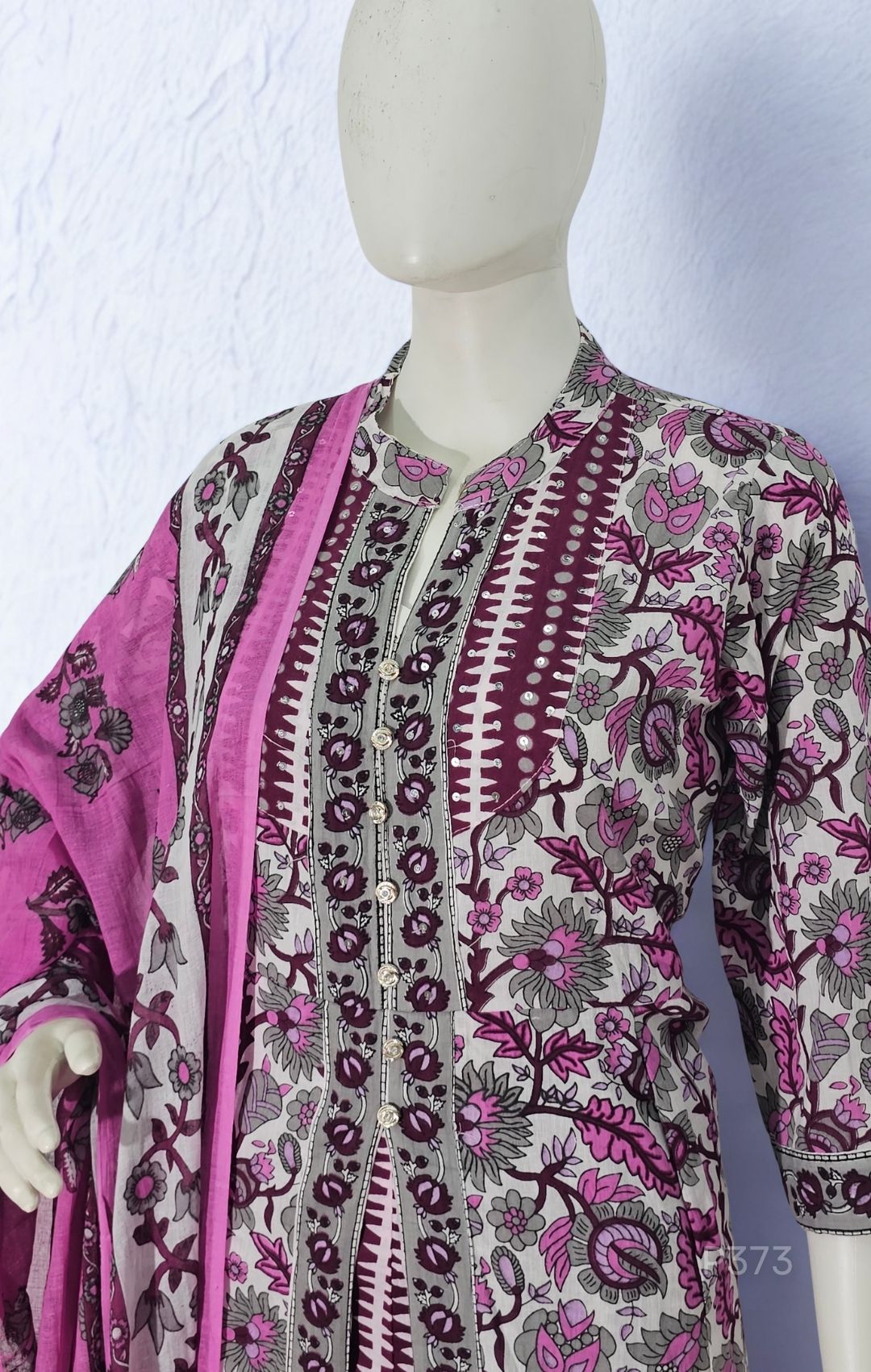 A 3-piece cotton kurta set in soft lilac and white, adorned with intricate floral block prints