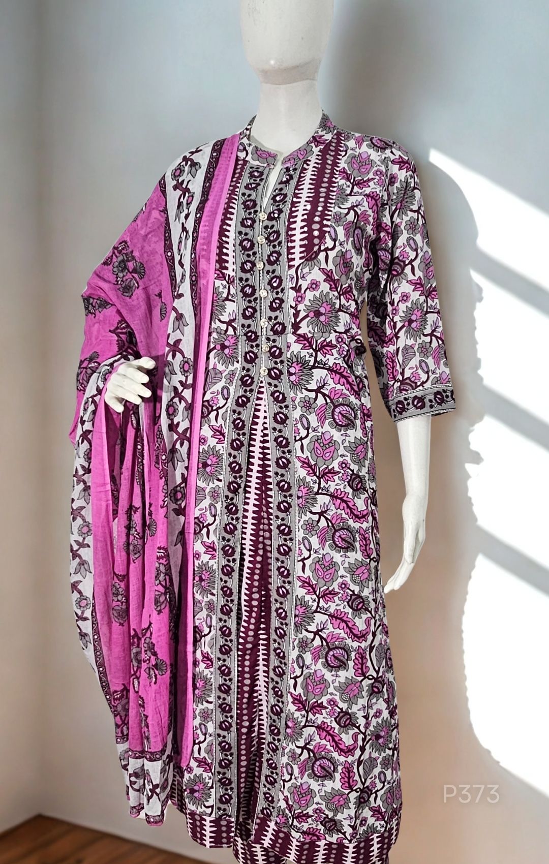 A 3-piece cotton kurta set in soft lilac and white, adorned with intricate floral block prints
