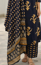 black traditional outfit with gold leaf patterns on a neutral background